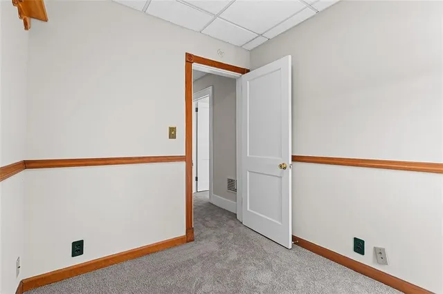 a bathroom with a toilet and a bathtub