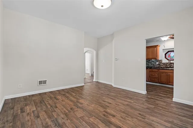 a view of kitchen space with wooden floor