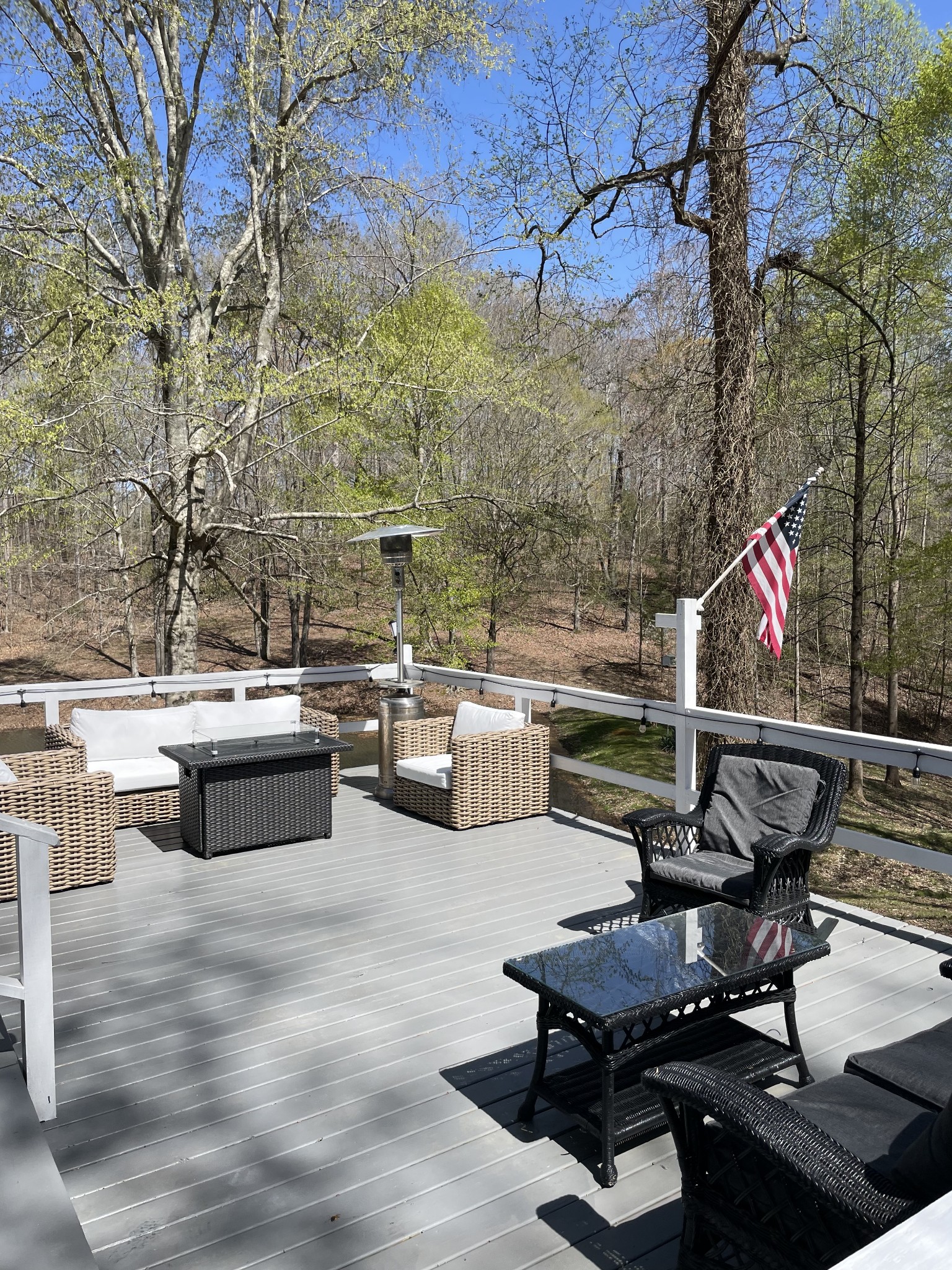 310 Shasteen Ridge Road Lynchburg, TN 37352 - Photo 17 of 36 a living room with patio furniture and a wooden floor