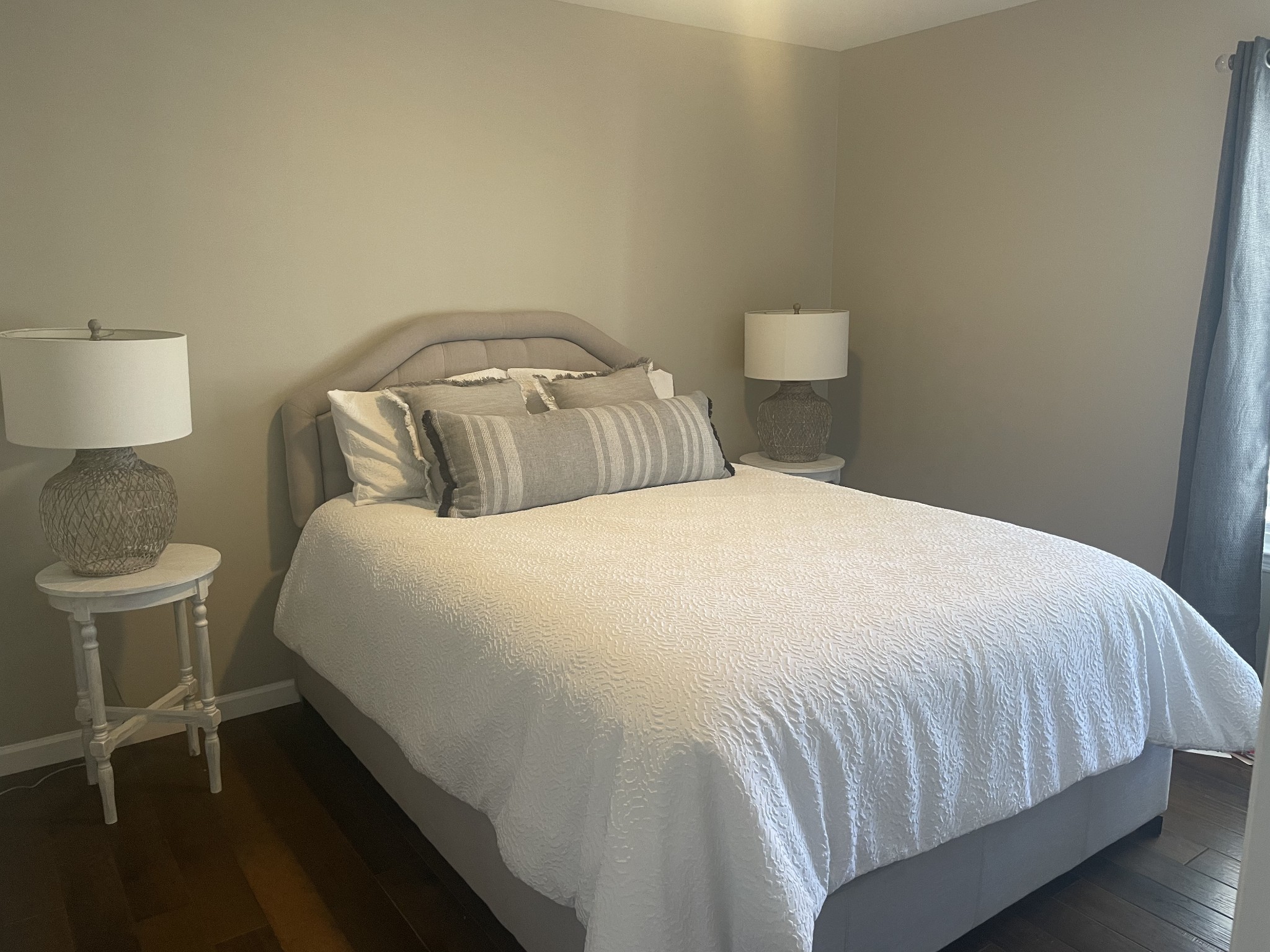 310 Shasteen Ridge Road Lynchburg, TN 37352 - Photo 20 of 36 a bedroom with a bed and a lamp on table