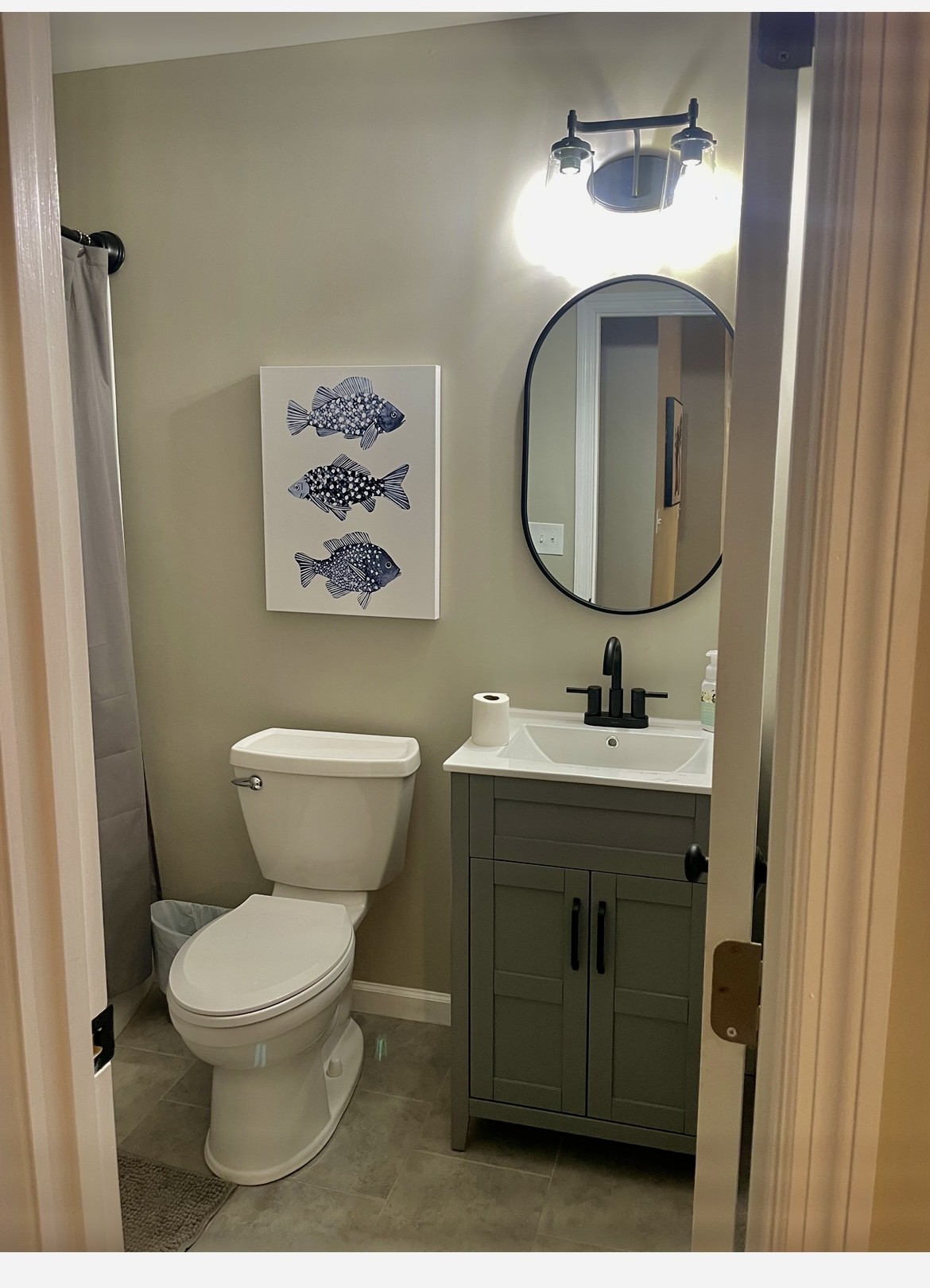 310 Shasteen Ridge Road Lynchburg, TN 37352 - Photo 22 of 36 a bathroom with a toilet sink and mirror