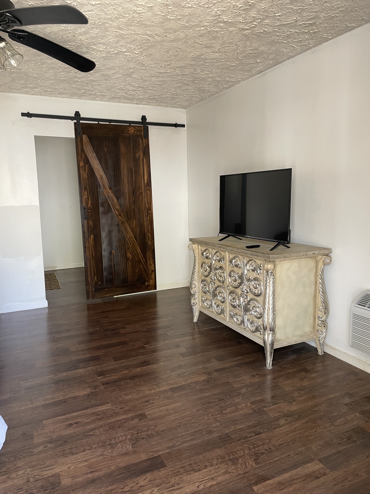 310 Shasteen Ridge Road Lynchburg, TN 37352 - Photo 27 of 36 a bedroom with a bed and a mirror