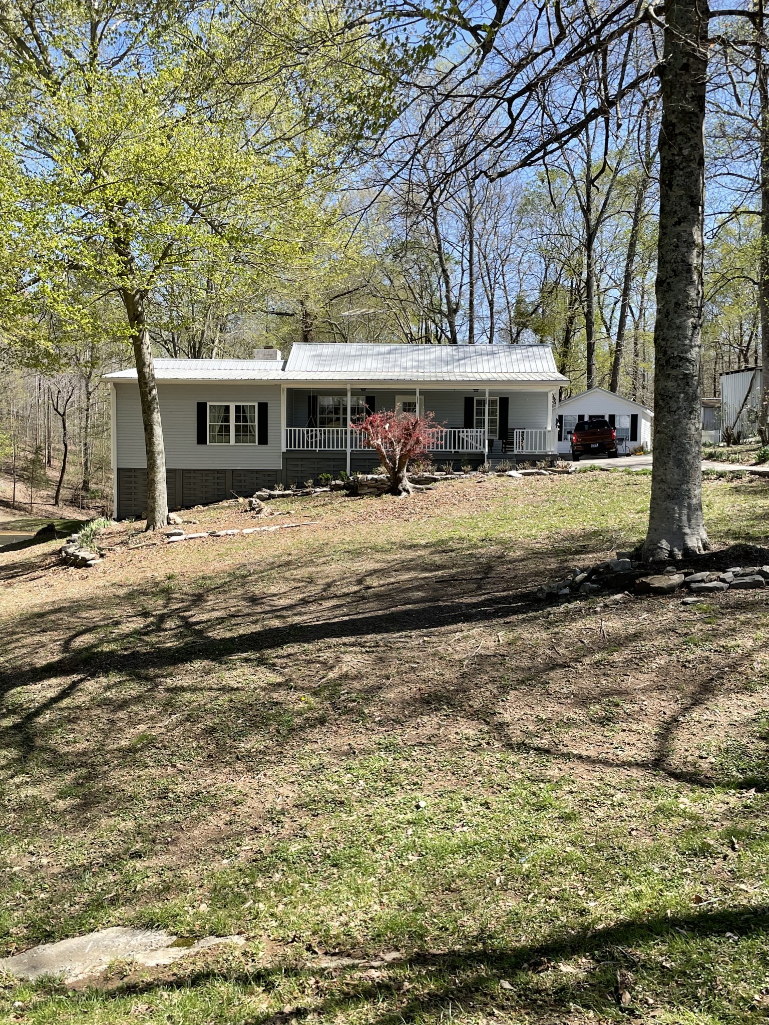 310 Shasteen Ridge Road Lynchburg, TN 37352 - Photo 29 of 36 a view of a house with a yard