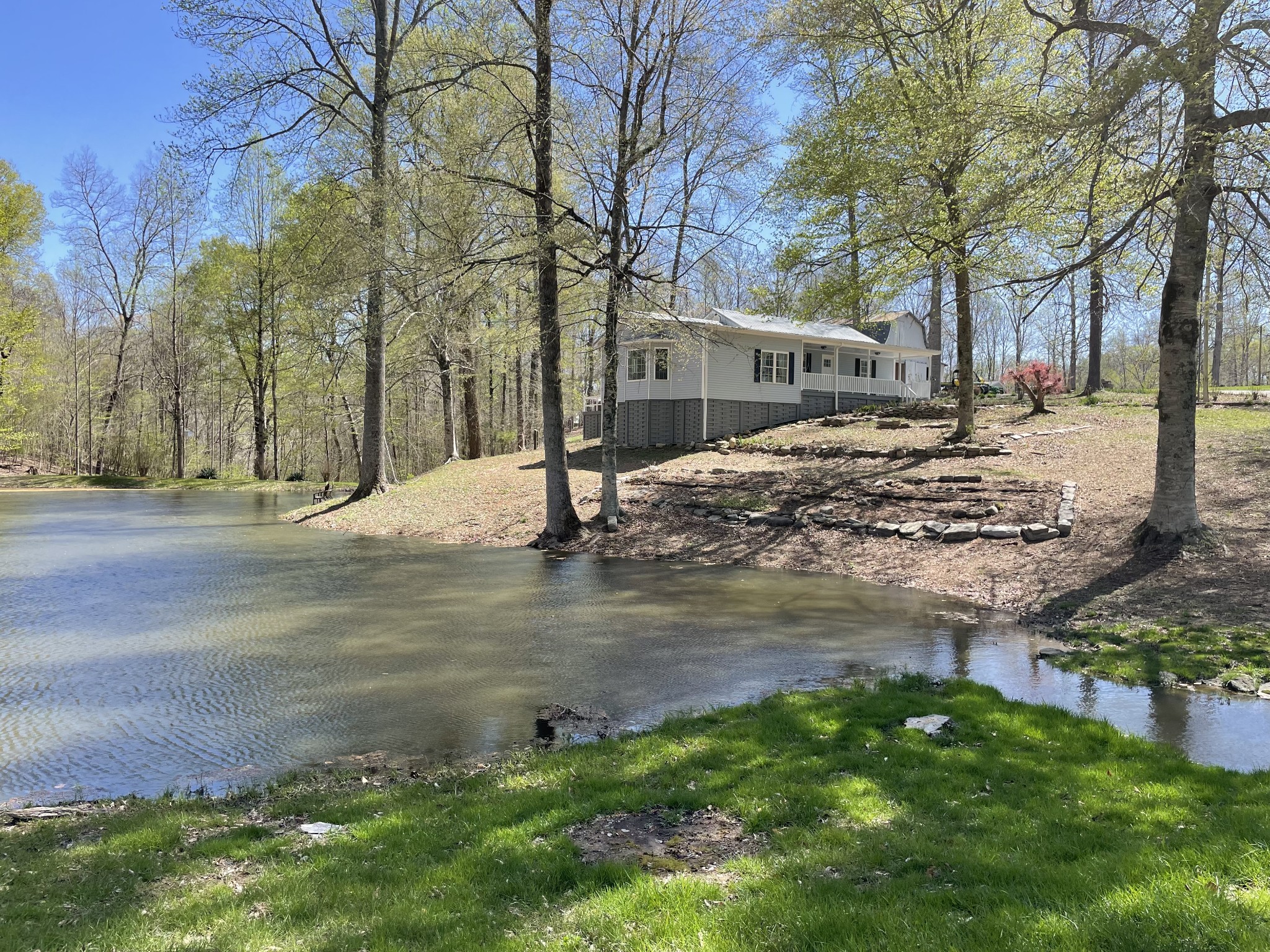 310 Shasteen Ridge Road Lynchburg, TN 37352 - Photo 31 of 36 a view of a yard with a tree