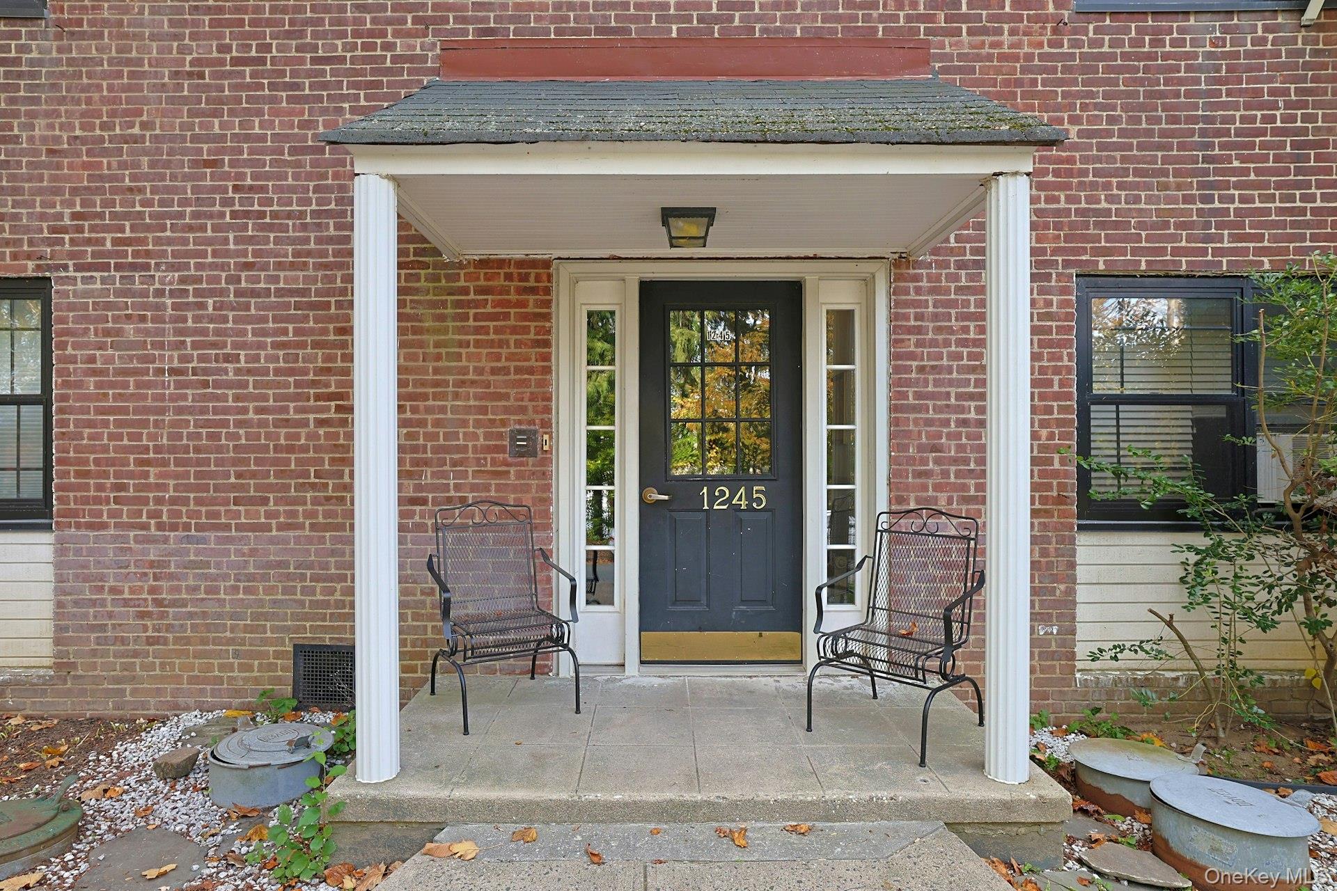 a front view of a house with a shower