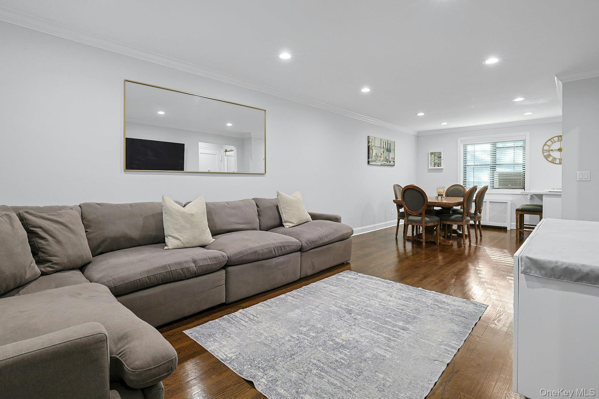1245 California Road, Unit B23 Eastchester, NY 10709 - Photo 3 of 21 a living room with furniture and wooden floor
