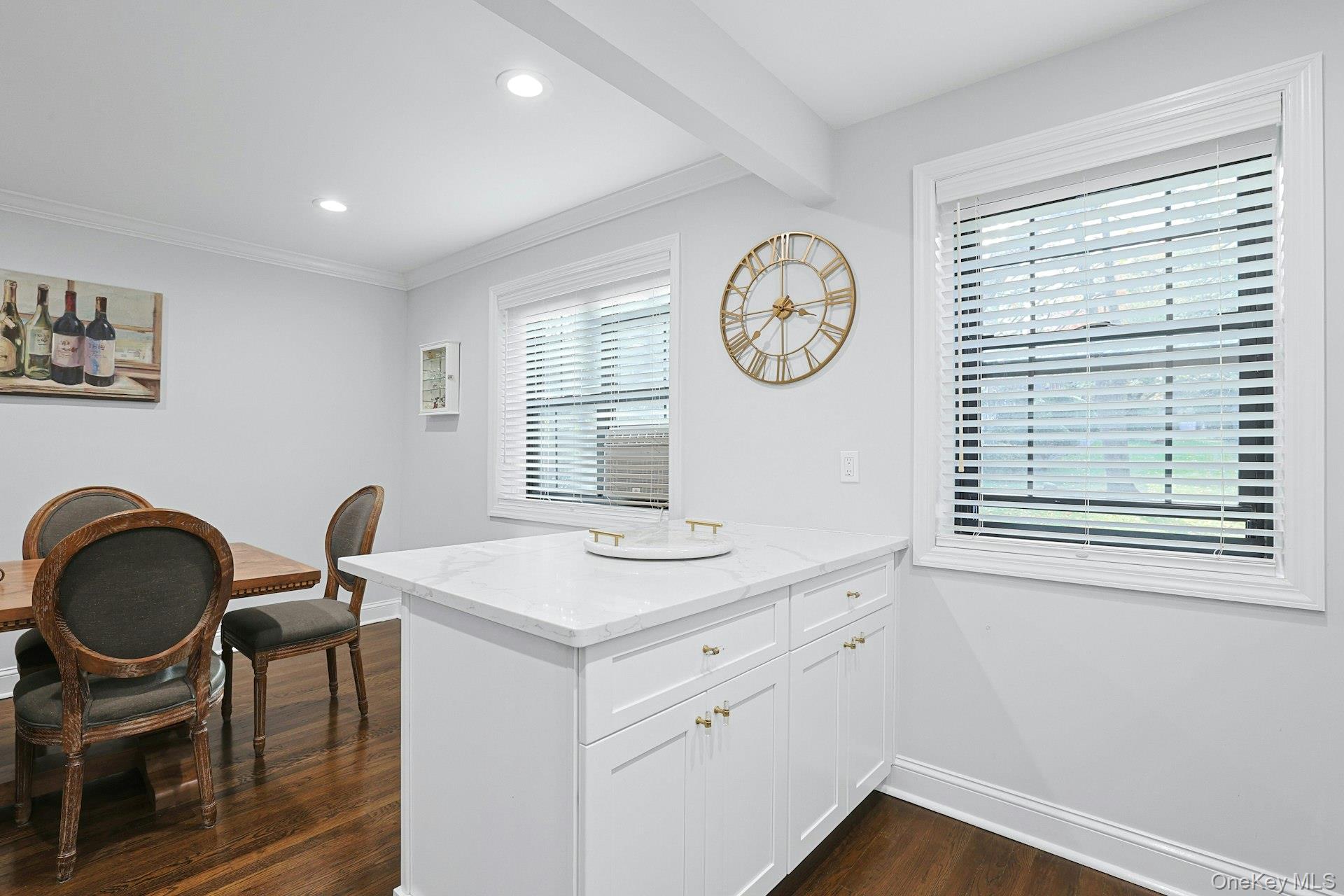 1245 California Road, Unit B23 Eastchester, NY 10709 - Photo 7 of 21 a view of a kitchen area with a sink and a chair