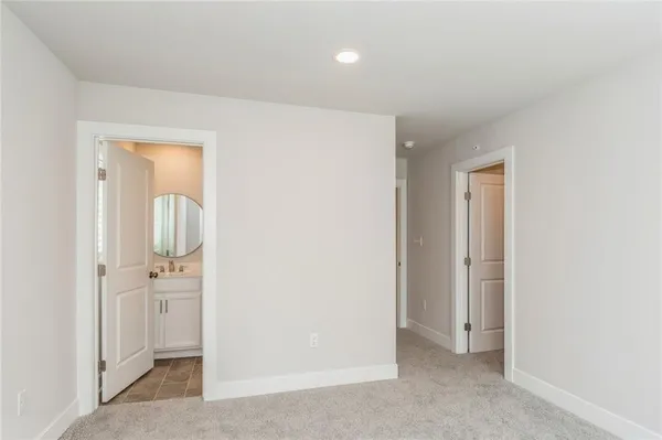 an empty room with mirror