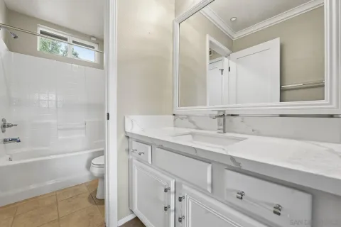 a bathroom with a sink and a toilet