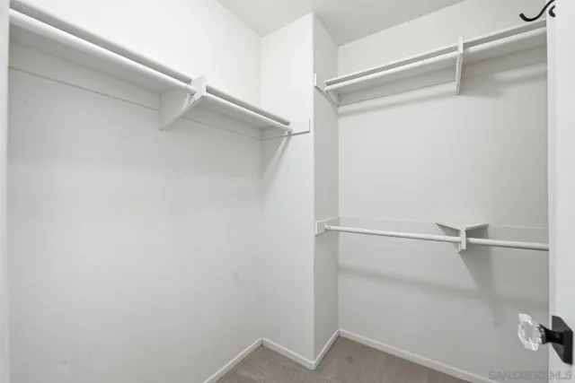 a view of an empty walk in closet