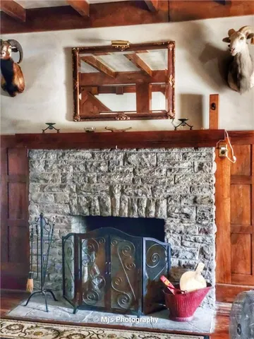 a living room with a fireplace