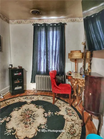 a room with furniture and a rug