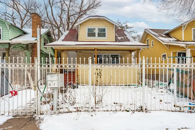 a front view of a house with a outdoor space