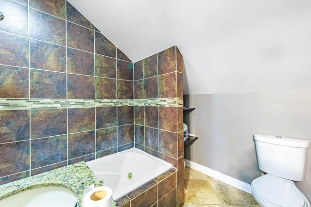 a bathroom with a sink and a toilet