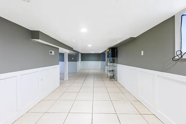 a view of entryway with stairs and a window