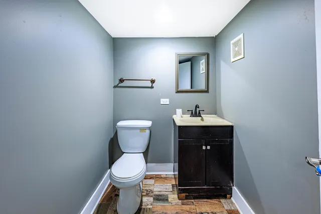 a bathroom with a sink and a toilet