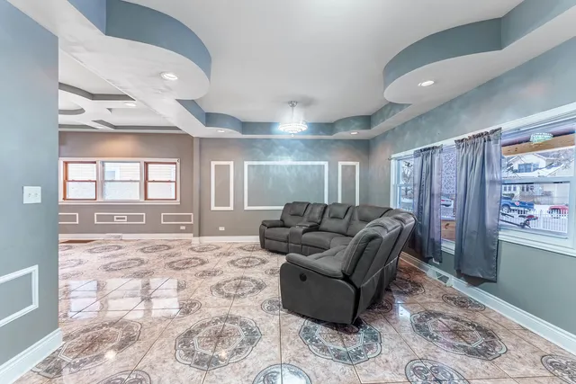 a living room with furniture and a rug