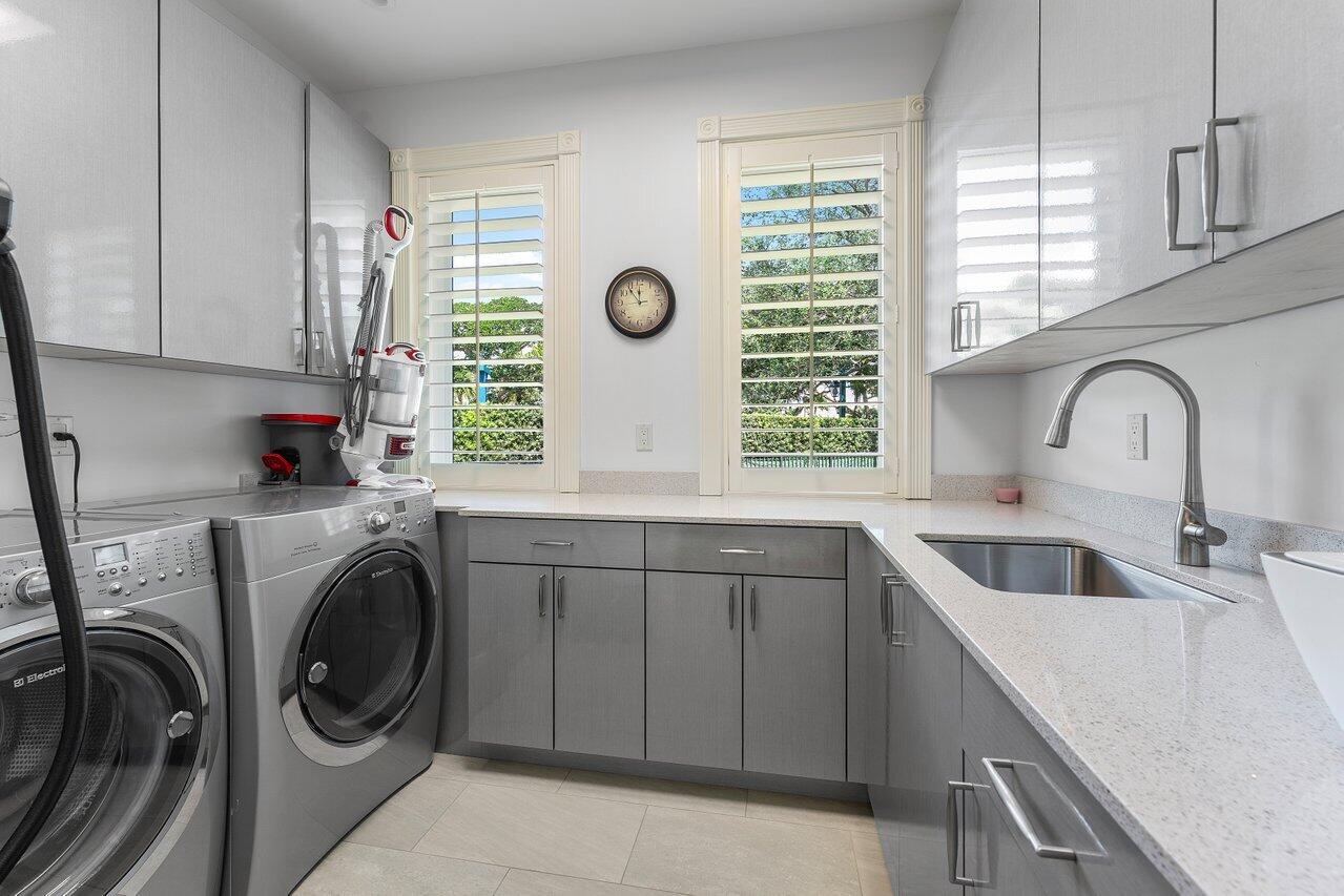 3208 Pilots Point Circle Jupiter, FL 33477 - Photo 45 of 59 Gym Laundry