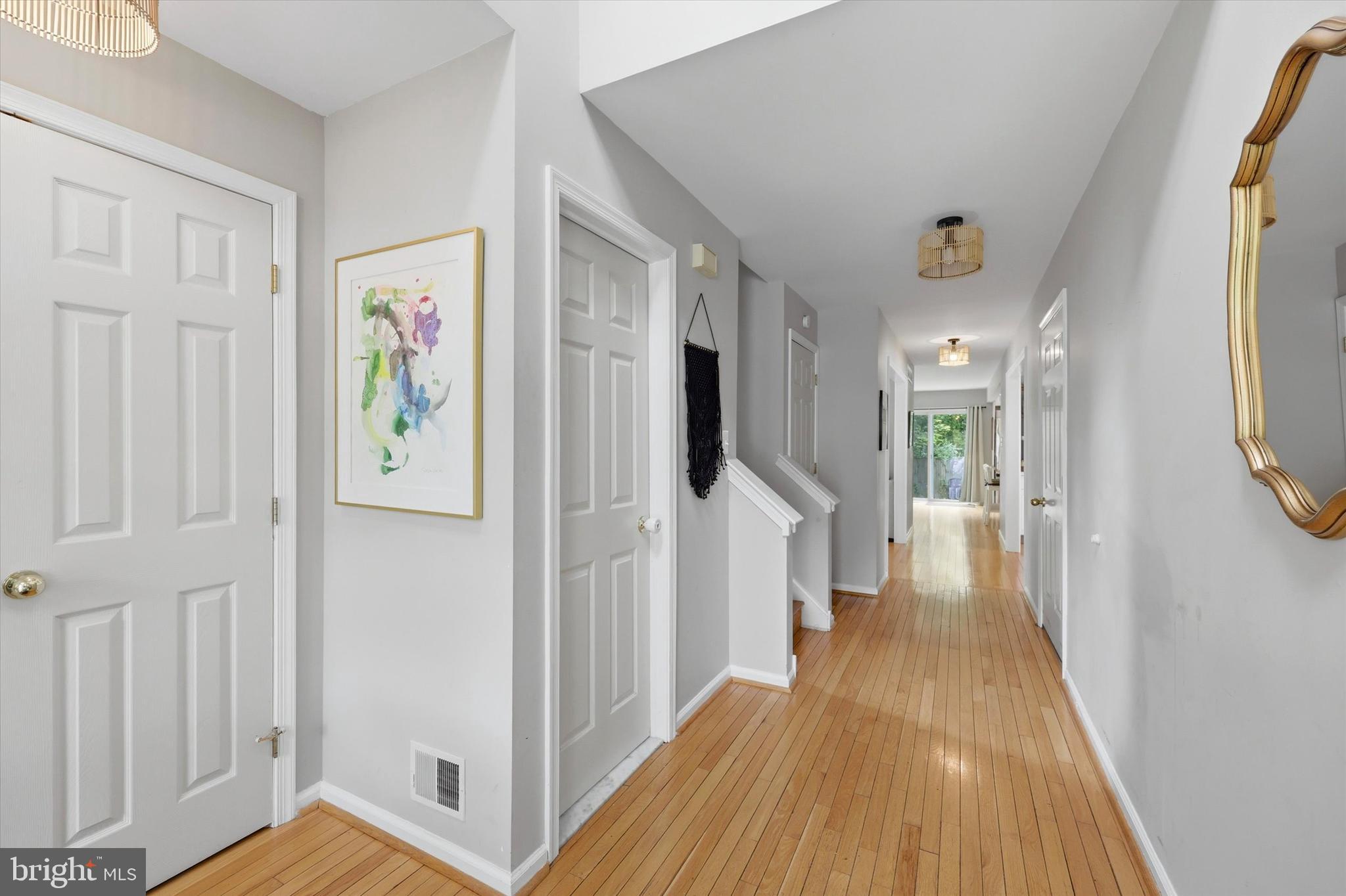 320 Maple Avenue Wyncote, PA 19095 - Photo 2 of 28 a view of a hallway view with wooden floor and staircase
