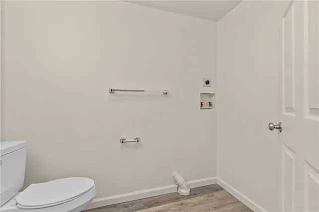 a bathroom with a toilet