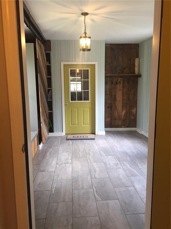 236 Mountain Road Cape Neddick, ME 03902 - Photo 3 of 28 Mudroom with tile floor and storage...