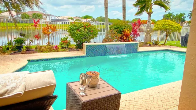 a view of a door and a window