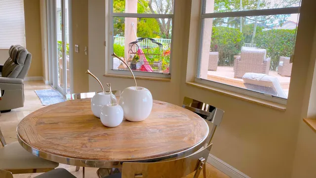 a living room with furniture and a table