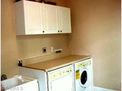 Other. 953 Rivers Edge Drive; Laundry Center with built-ins. Large room wired for cable and phone. Laundry sink. White Cabinetry. Front Load appliances included!