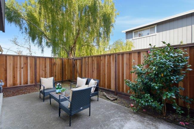 1031 Colonel Way Half Moon Bay, CA 94019 - Photo 34 of 52 a backyard of a house with table and chairs