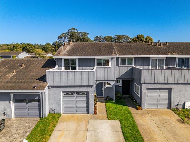 1031 Colonel Way Half Moon Bay, CA 94019 - Photo 42 of 52 a front view of a house with a yard