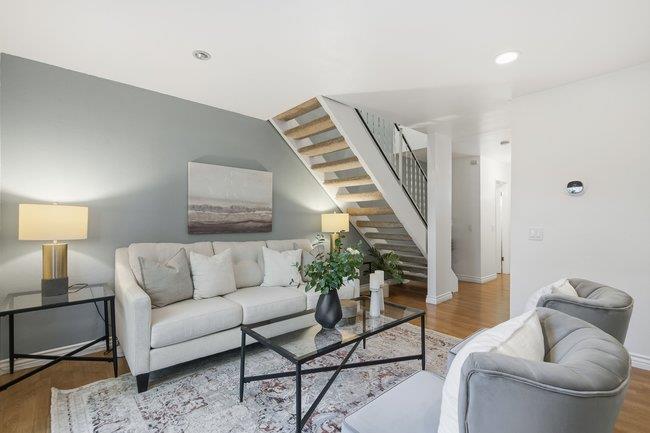 1031 Colonel Way Half Moon Bay, CA 94019 - Photo 6 of 52 a living room with furniture and a potted plant
