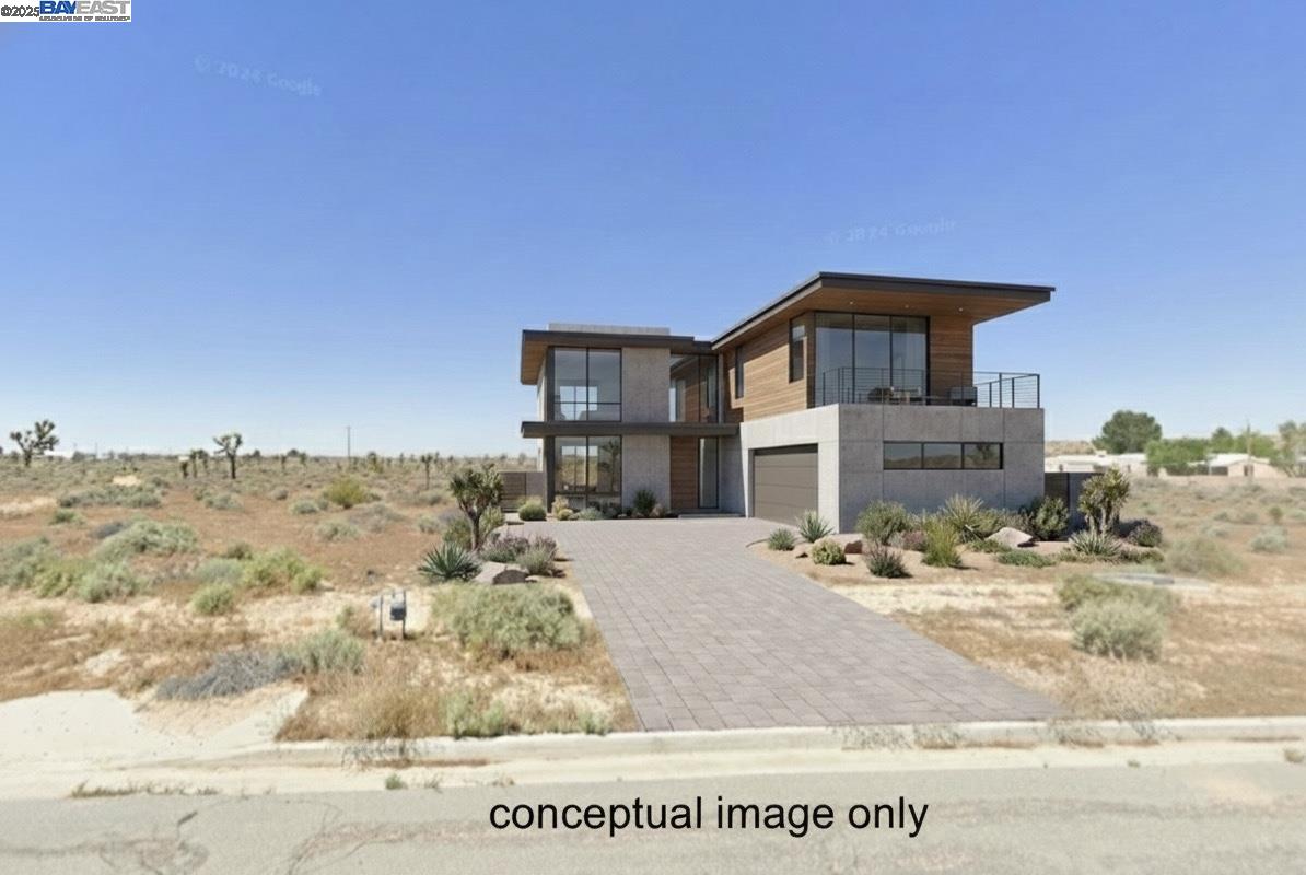 26601 Prospect Street Boron, CA 93516 - Photo 2 of 7 a front view of a house with a yard