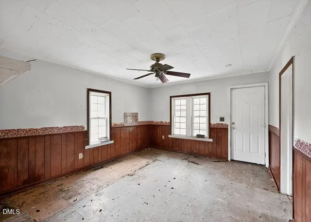 a view of workspace with furniture and window