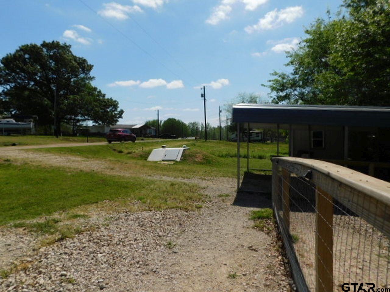 285 Caddo Quitman, TX 75783 - Photo 7 of 14 a view of a garden with a slide