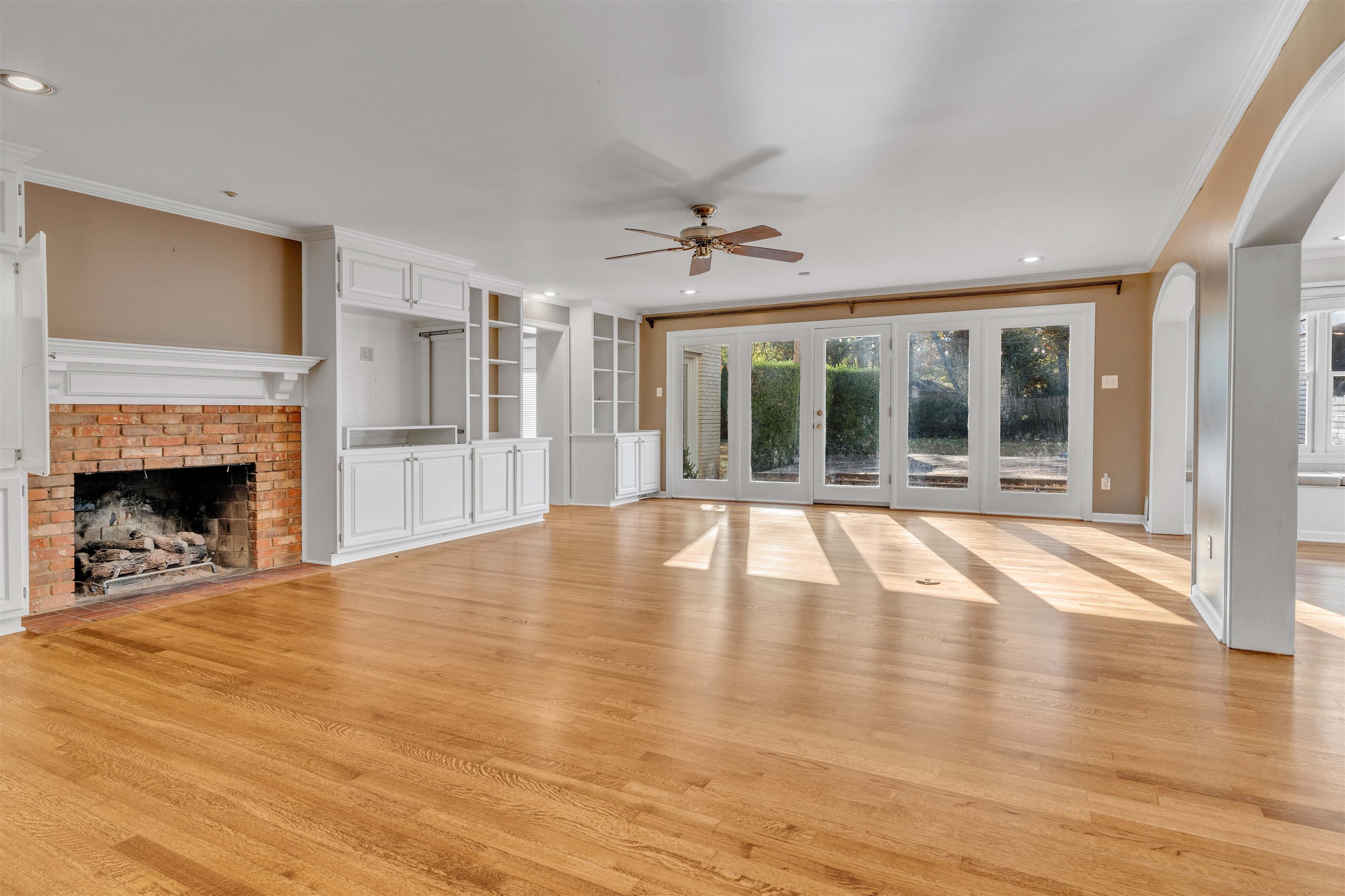 2014 Heather Cove Memphis, TN 38119 - Photo 15 of 40 a view of an empty room with exposed radiator and fireplace