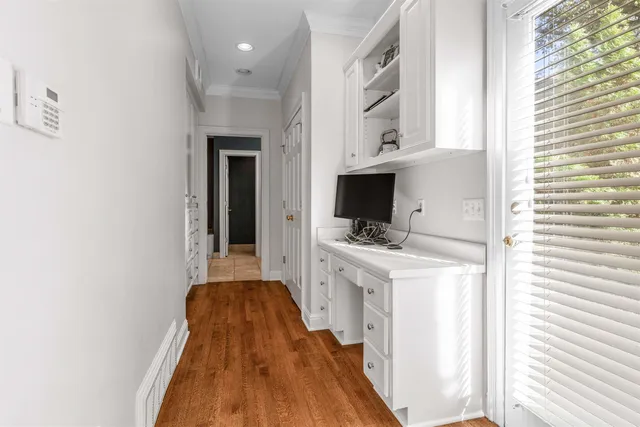 a kitchen with a stove and a white refrigerator