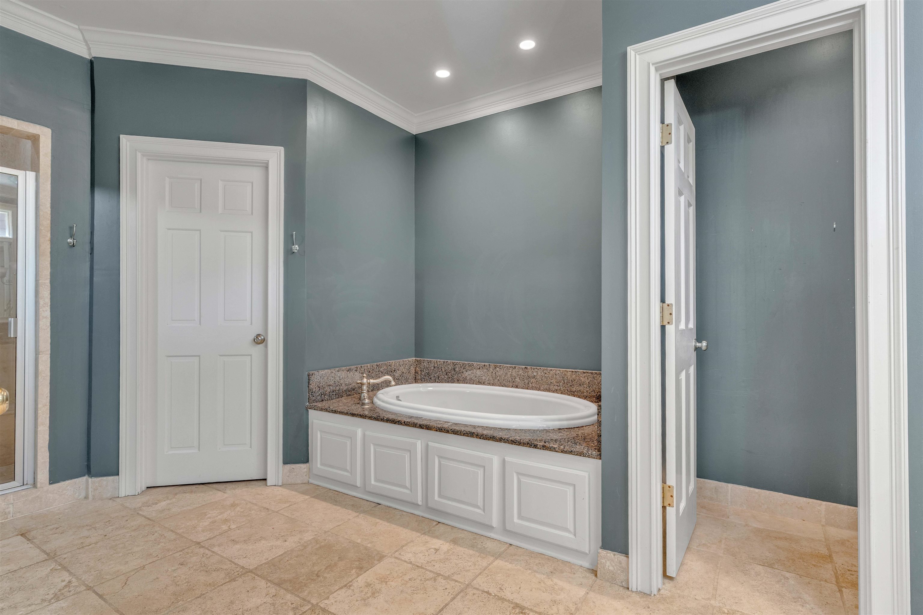 2014 Heather Cove Memphis, TN 38119 - Photo 20 of 40 Bathroom with a garden tub, crown molding, recessed lighting, and a shower stall