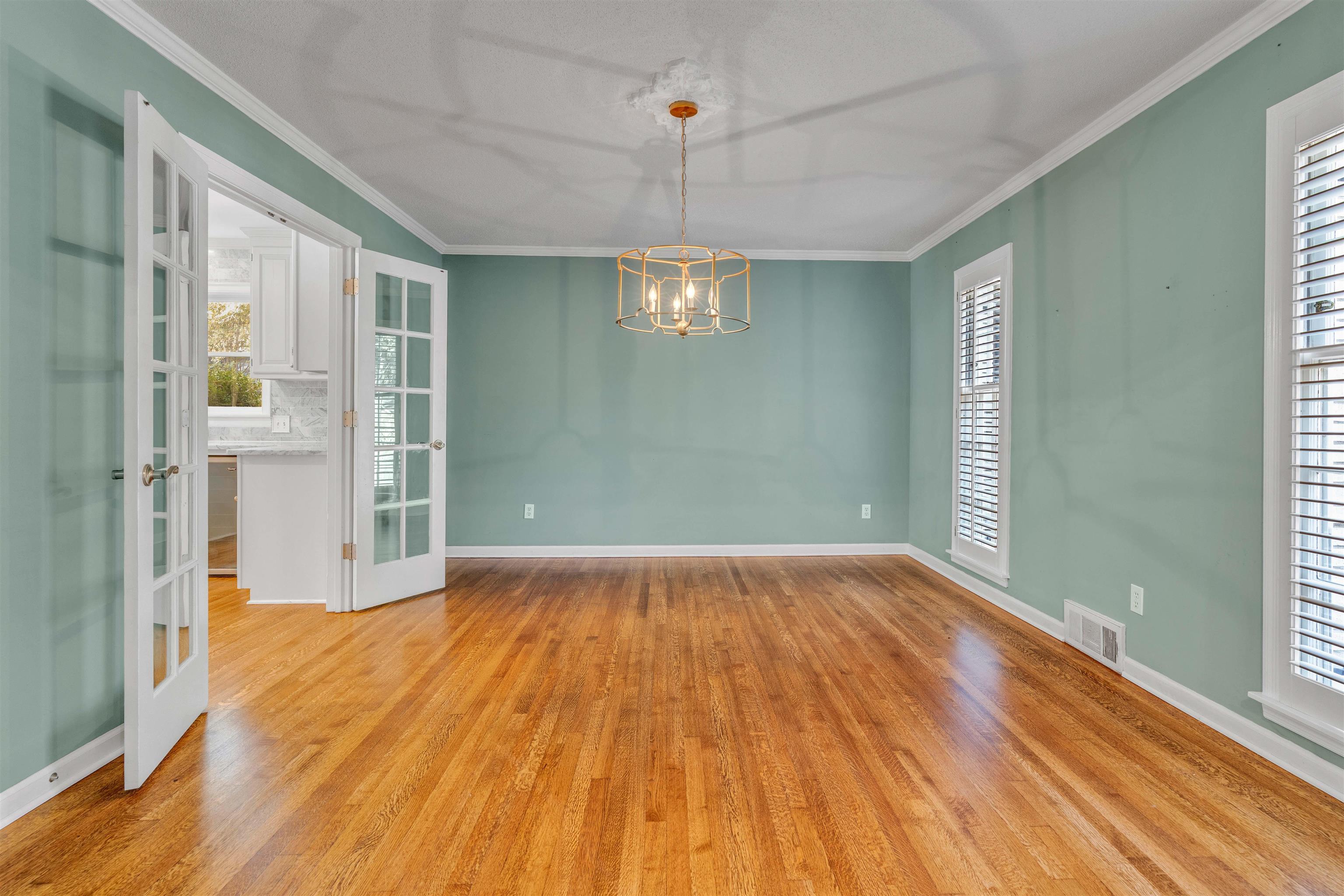 2014 Heather Cove Memphis, TN 38119 - Photo 4 of 40 a view of empty room with wooden floor and fan