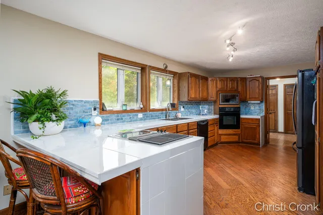 $400,000 | 12501 Pine Island Drive Northeast, Sparta, MI 49345