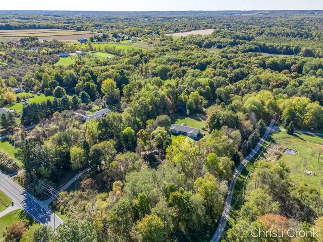 $400,000 | 12501 Pine Island Drive Northeast, Sparta, MI 49345