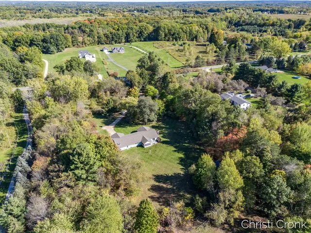 $400,000 | 12501 Pine Island Drive Northeast, Sparta, MI 49345