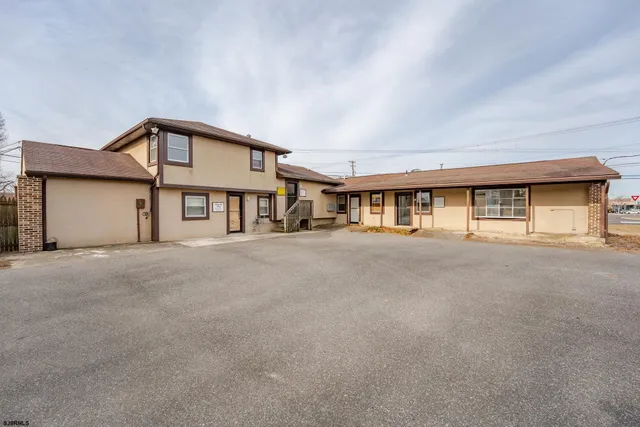 a big house with large windows