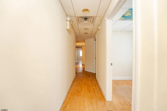 a view of a house with a street