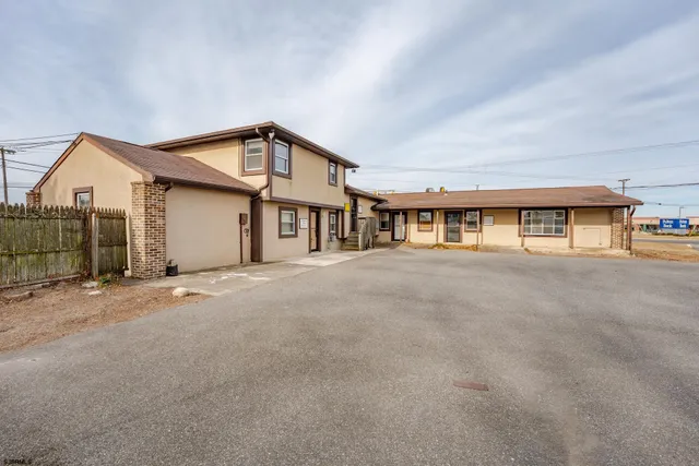 a view of a street with cars