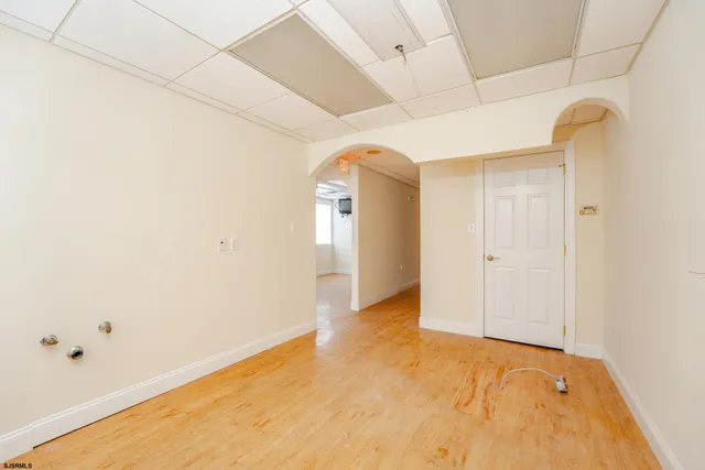 a view of swimming pool in front of residential houses