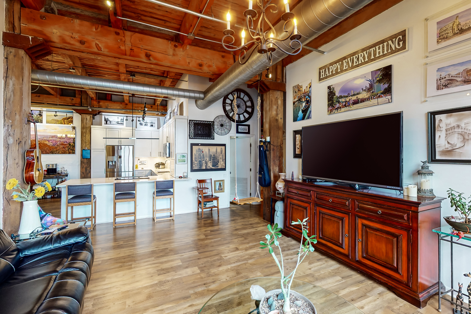312 North May Street, Unit 3F Chicago, IL 60607 - Photo 12 of 22 a living room with furniture and a flat screen tv