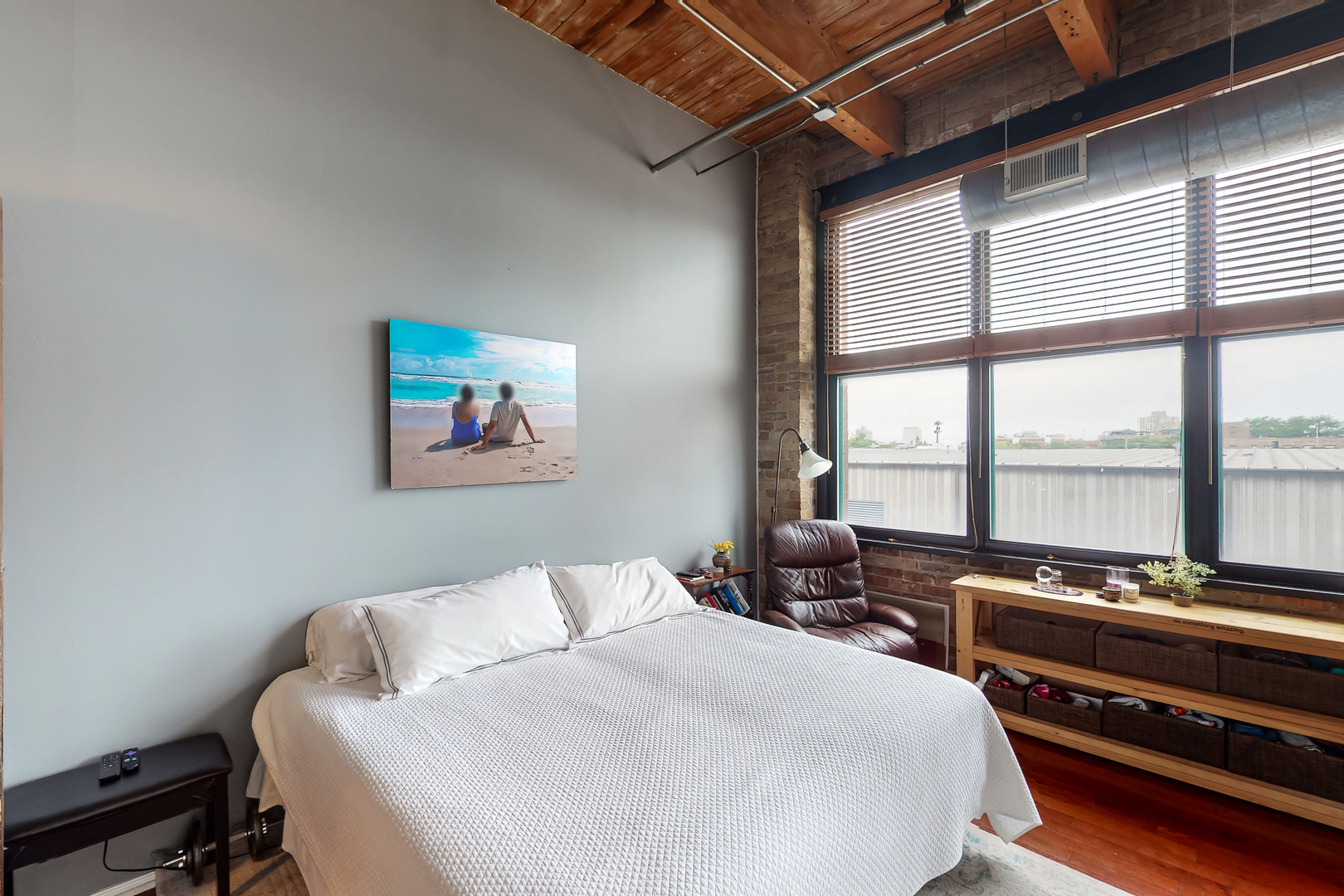 312 North May Street, Unit 3F Chicago, IL 60607 - Photo 16 of 22 a bedroom with a bed and a large window