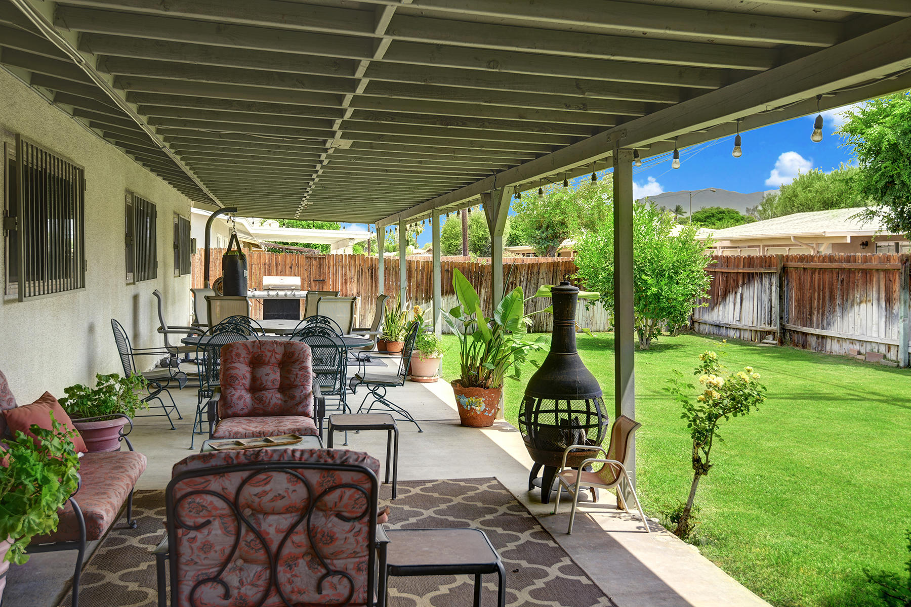 44952 Windsor Drive Indio, CA 92201 - Photo 24 of 24 a patio with yard table and chairs
