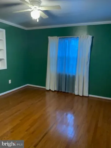 a view of wooden floor and staircase