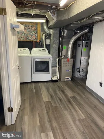 a bathroom with a toilet and shower